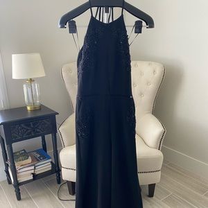 Black halter jumpsuit with gorgeous details